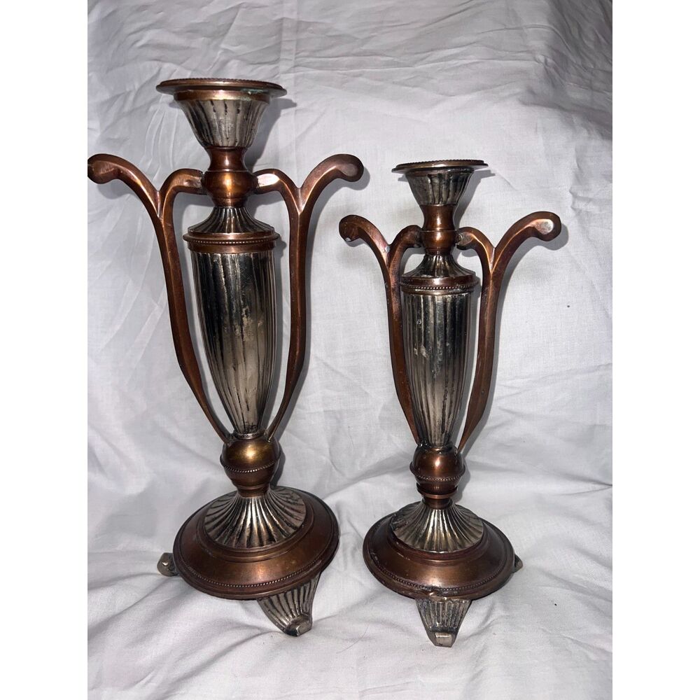 ornate victorian-style silver/copper candlestick holders